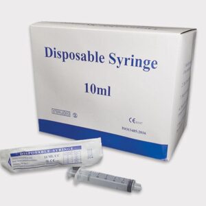 tube of disposable syringe next to a tube of di