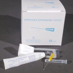 box of disposable hypoderic needle next to a needle